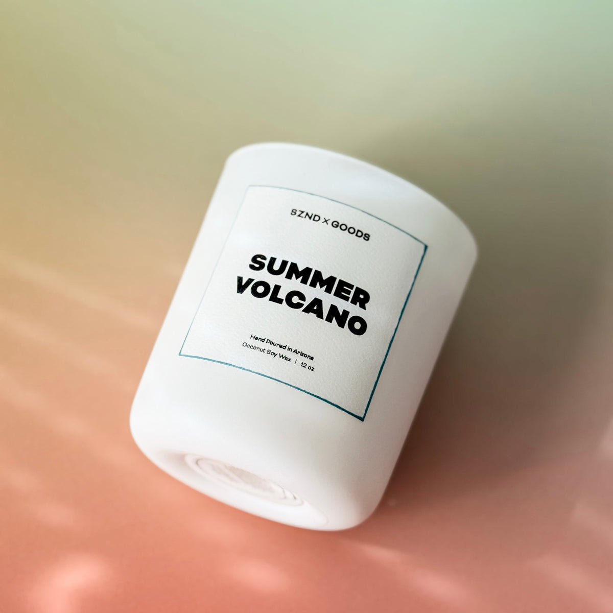 Summer Volcano candle on a bright background.