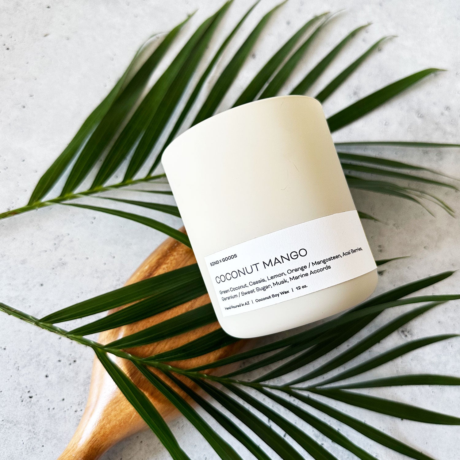 Coconut Mango candle has notes of lemon, orange, acai, sugar and musk.