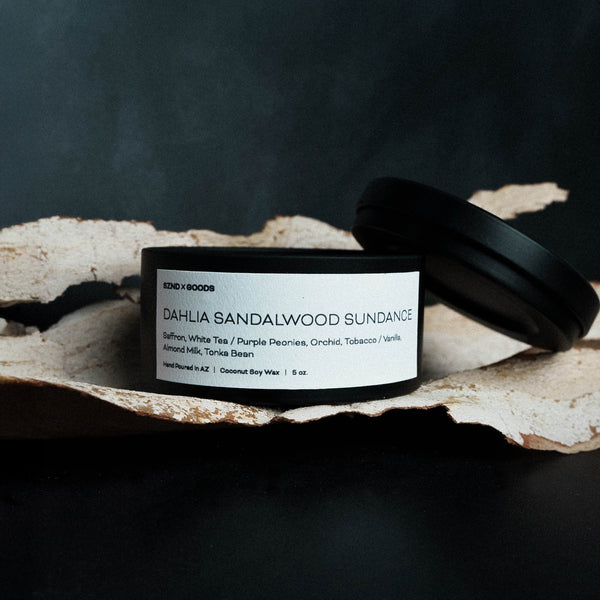 5oz candle with a label on a dark background.
