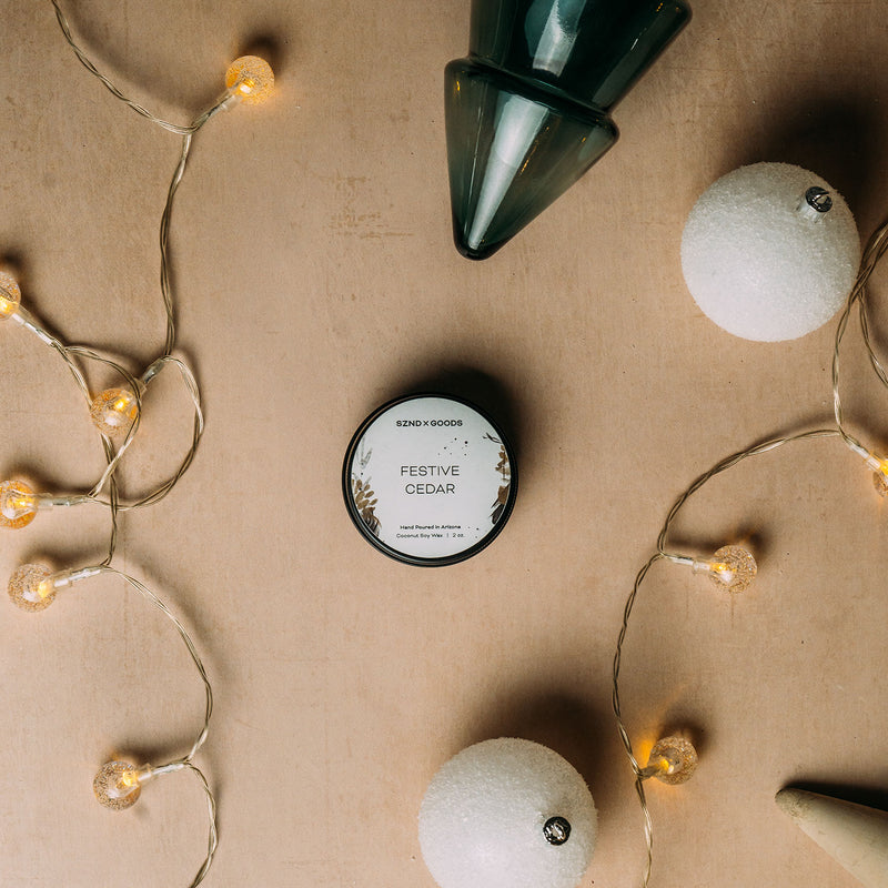 A Festive Cedar wooden wick candle tin