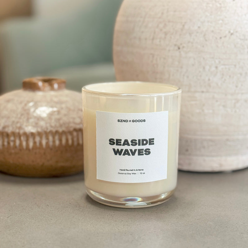 Candle labeled 'Seaside Waves' on a neutral background