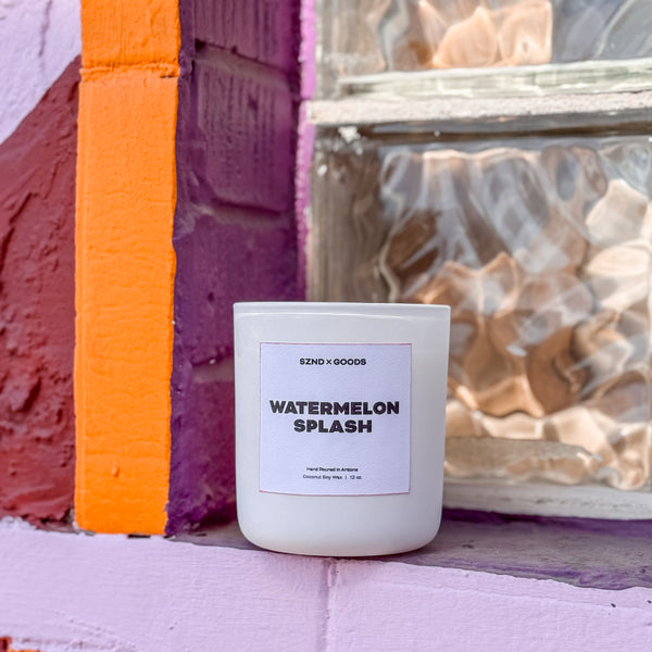 Watermelon 12oz candle on brightly colored window sill.