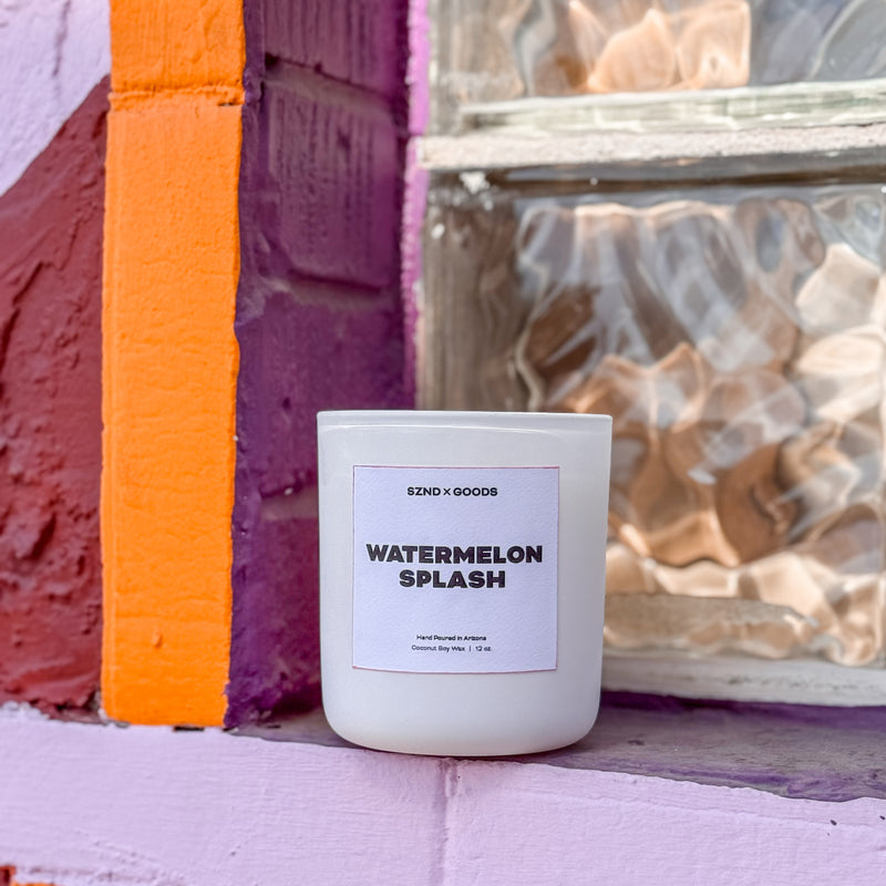 Watermelon 12oz candle on brightly colored window sill.