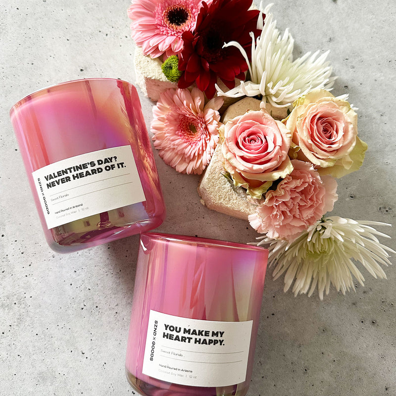 Styled apricot wooden wick candles in pink jars